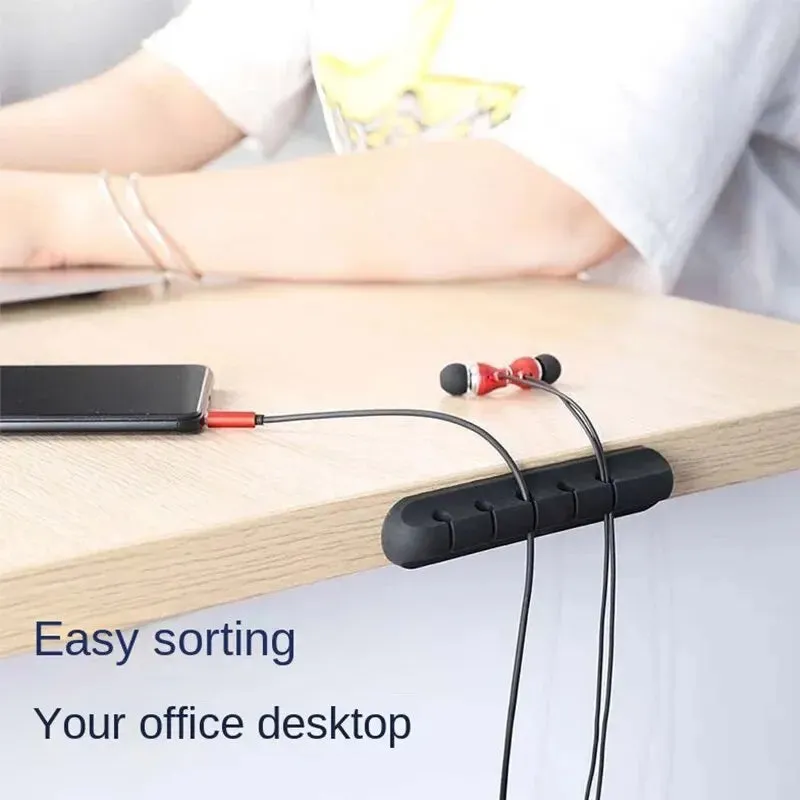 Adhesive Cord Manager for Mobile Devices